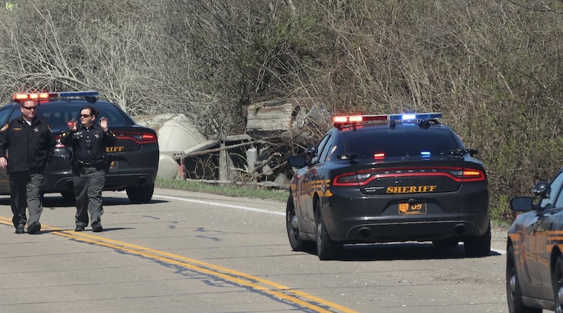 One person was killed in a crash after a semi-truck rolled onto its side on state Route 235 near Byron Road in Bath Twp. on Tuesday, April 12, 2022. BILL LACKEY / STAFF