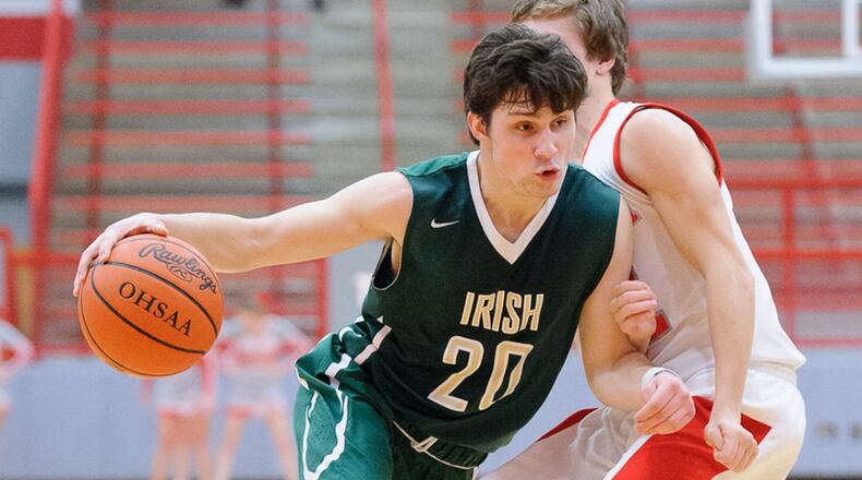 Catholic Central senior guard Thomas Kavanagh dribbles during a sectional tournament game against Twin Valley South on Wednesday. The Irish will play Southeastern in a sectional final on Saturday. Contributed Photo by Bryant Billing