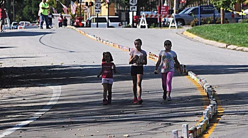 The first attempt at building a Mile of Food The Heritage of Flight Festival was in 2019. It's an attempt to collect non-perishable food items to be donated. MARSHALL GORBY/STAFF