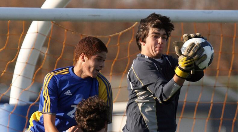 Springfield Catholic Central's goalie John Derr stops a shot on goal during the Division III Regional Final game against Cincinnati's Seven Hills Saturday Nov. 7, 2009, at Virgil Schwarm stadium in Hamilton. Staff photo by Nick Daggy