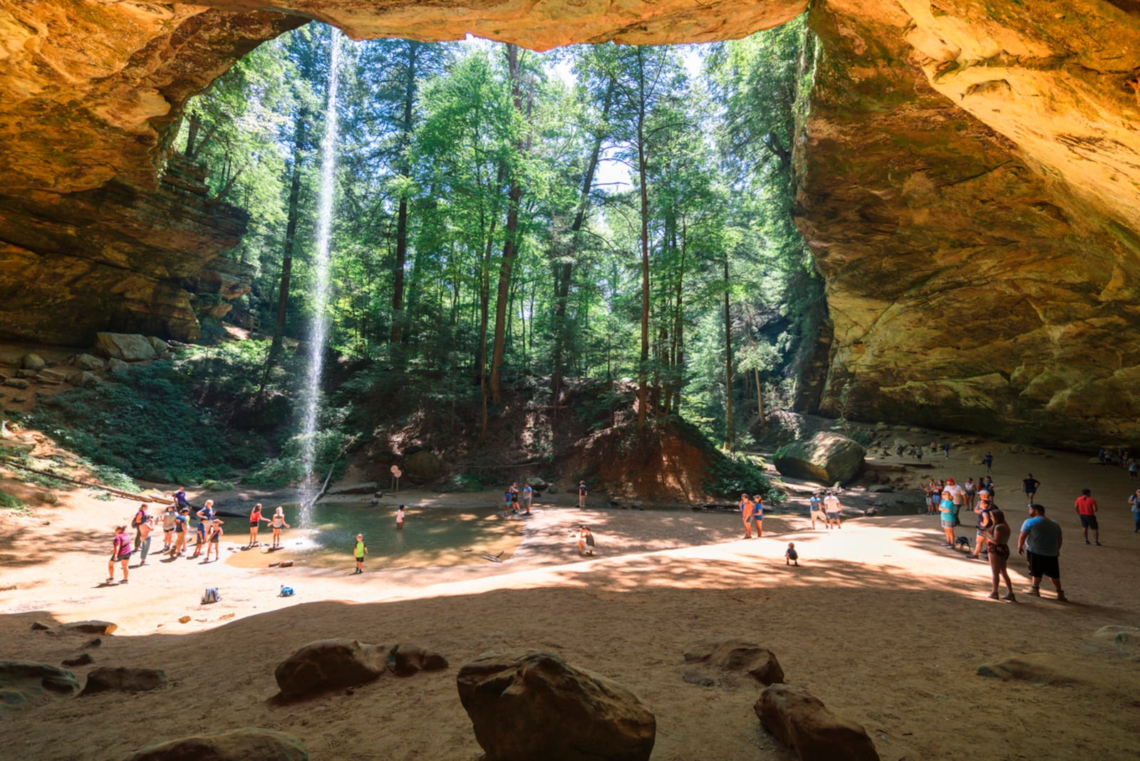 Ash Cave in Hocking Hills State Park has Ohio's largest recess cave. This stop features a horseshoe-shaped rim spanning 700 feet and runoff waterfall. ISTOCK