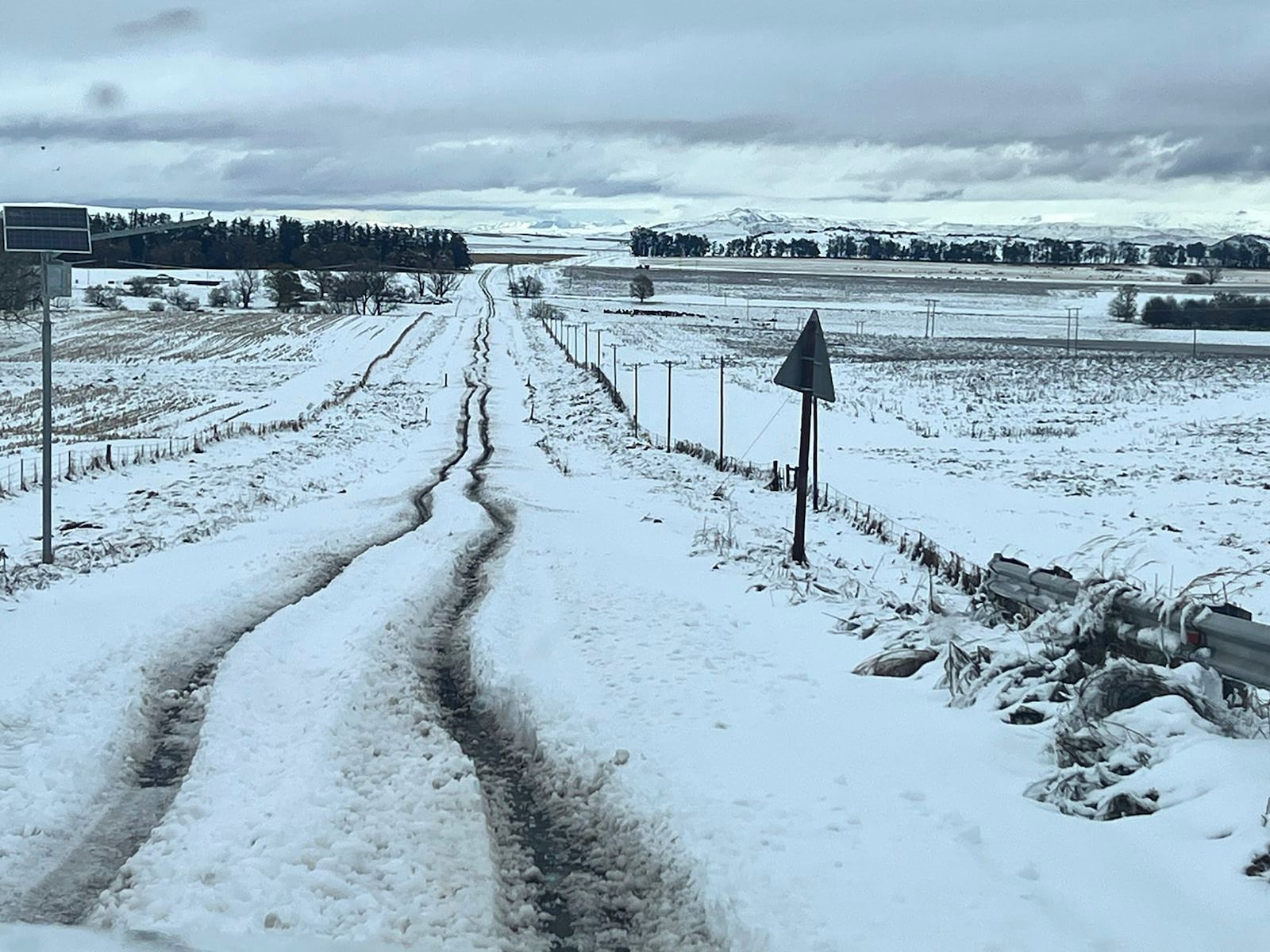 Snow covers the N2 road heading to Nolangeni, South Africa, Tuesday, June 10, 2025. (Greater Kokstad Municipality via AP)