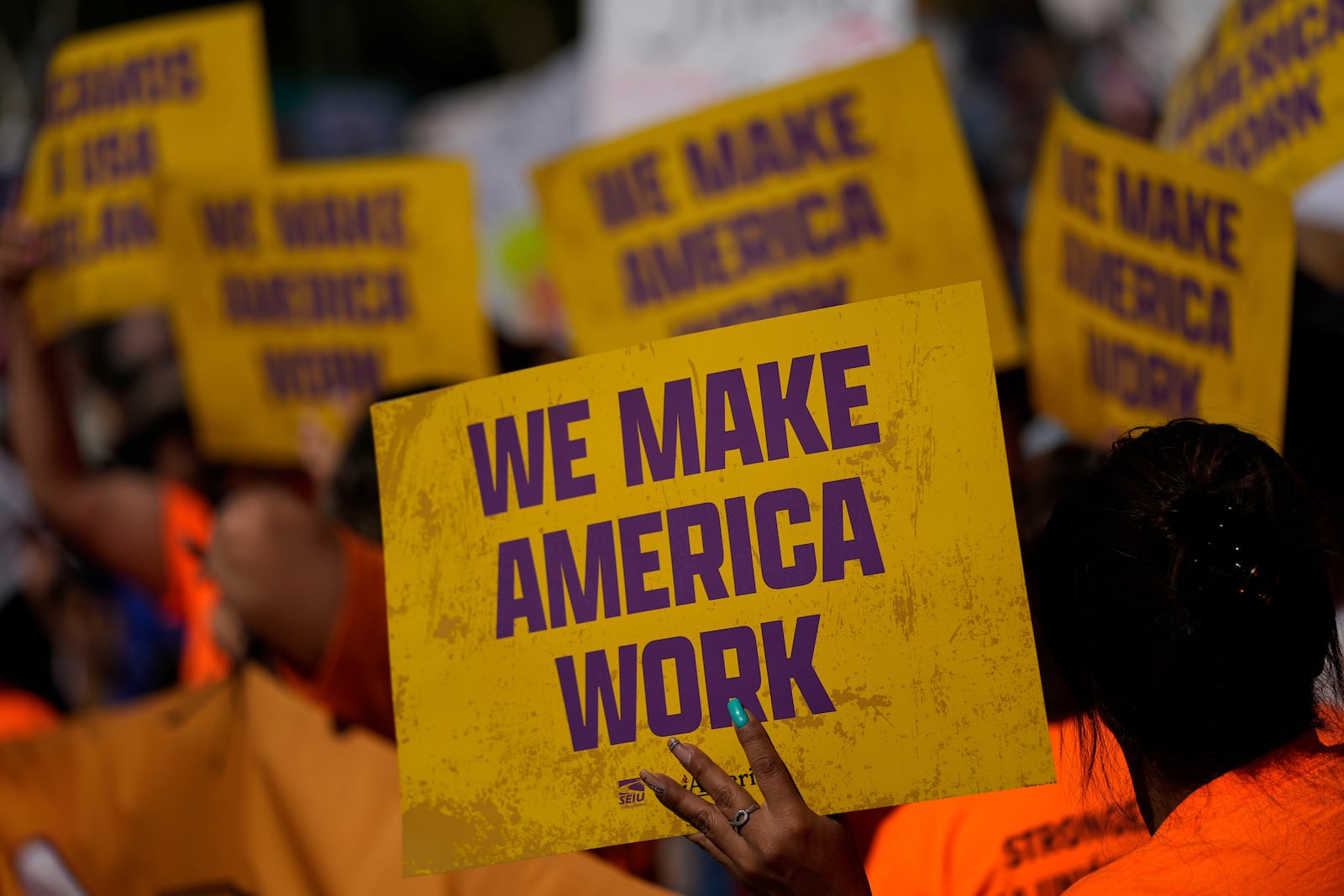 Demonstrators gather during a May Day protest at the Capitol, Thursday, May 1, 2025, in Phoenix. (AP Photo/Matt York)