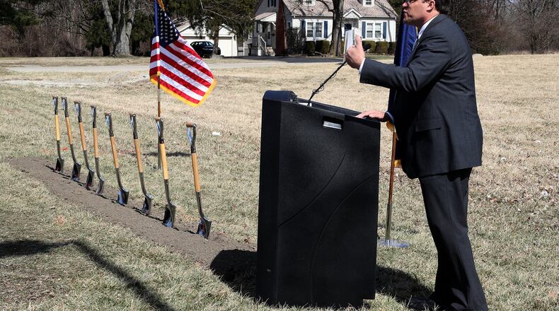 Philip Kirk, Dayton VA Medical Center Chief of Engineering, talks about the new Springfield Community Based Outpatient Clinic on North Limestone Street during the groundbreaking ceremony Tuesday. BILL LACKEY/STAFF