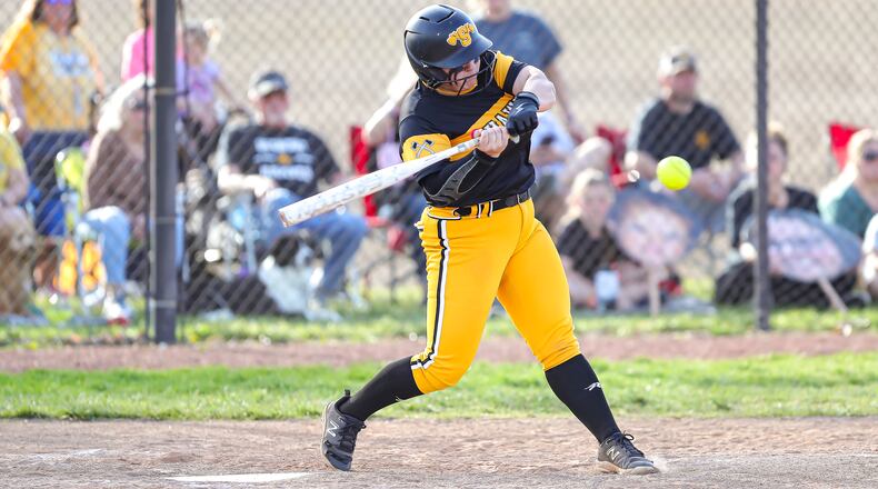 Shawnee High School senior Maura Simpson swings the bat during their game against Benjamin Logan on April 23 in Springfield. MICHAEL COOPER / STAFF