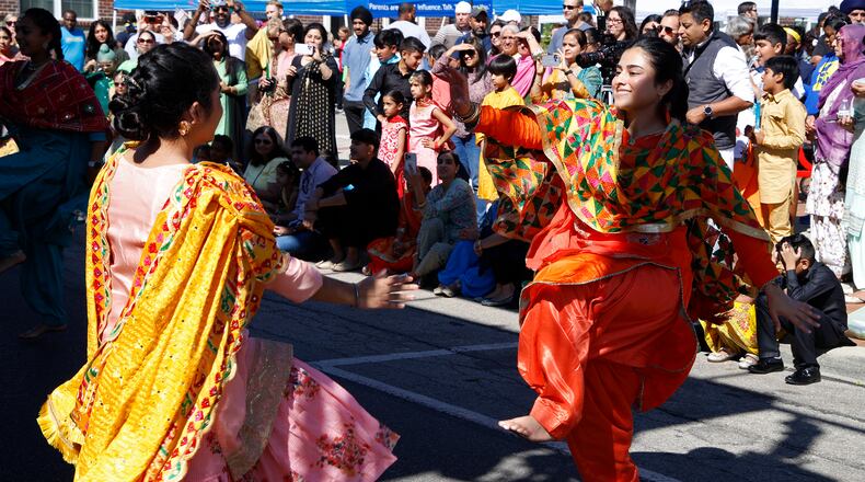 The Sikh In America dance group shared their culture with the Springfield community during the Springfield CultureFest Saturday, Sept. 23, 2023. The annual festival, held in a new location on Main Street and National Road Commons park, includes merchandise and informational vendors, bands, dance groups, a DJ, food trucks, and the Cincinnati Circus group. BILL LACKEY/STAFF