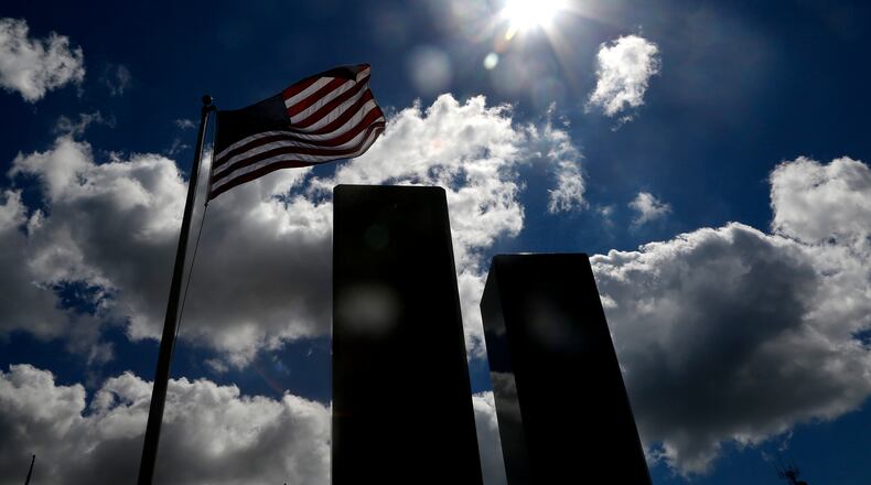 The Warren County 9/11 Memorial in Lebanon features a piece of I-beam from the World Trade Center and two 9-foot granite columns that represent the Twin Towers. LISA POWELL / STAFF