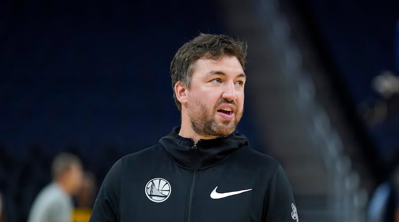 FILE - Golden State Warriors assistant coach Chris DeMarco stands before an NBA preseason basketball game against the Denver Nuggets in San Francisco, Oct. 14, 2022. (AP Photo/Jeff Chiu, File)