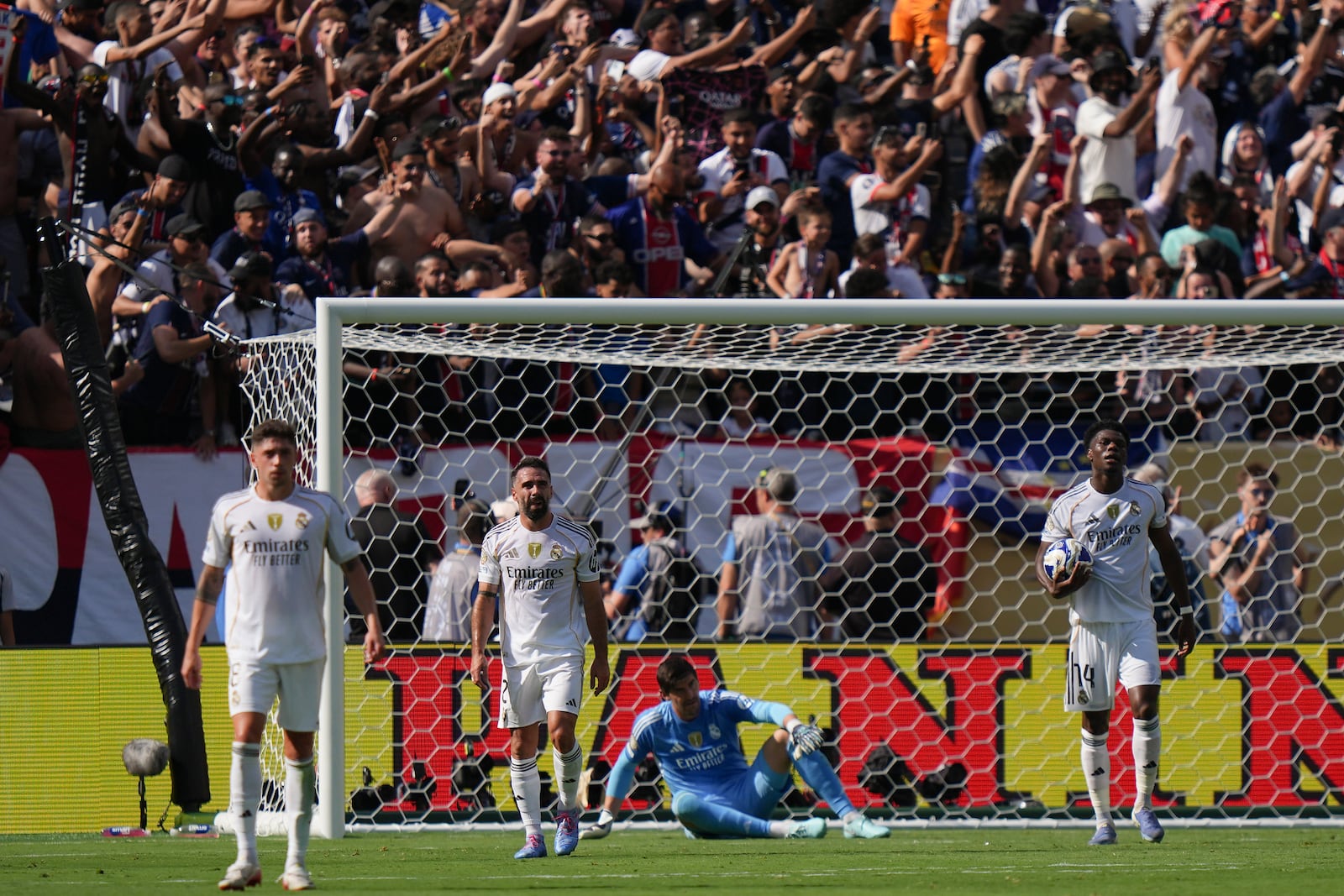 From left, Real Madrid's Federico Valverde, Dani Carvajal, Thibaut Courtois and Aurelien Tchouameni react after a goal by Paris Saint-Germain during the second half of a Club World Cup semifinal soccer match in East Rutherford, N.J., Wednesday, July 9, 2025. (AP Photo/Frank Franklin II)