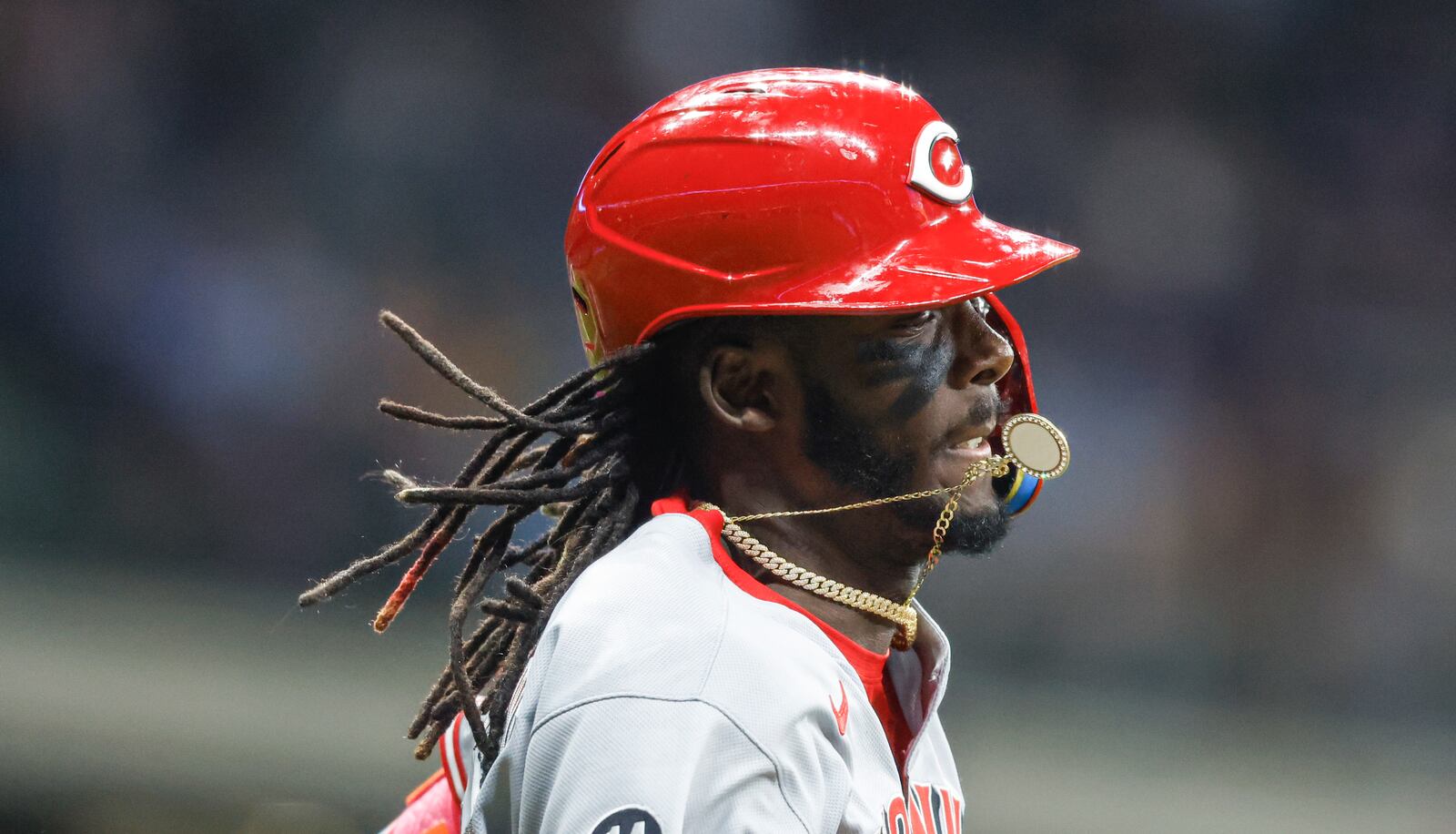 Cincinnati Reds shortstop Elly De La Cruz (44) runs to first base while grounding out to the Milwaukee Brewers during the eighth inning of a baseball game, Thursday, April 3, 2025, in Milwaukee. (AP Photo/Jeffrey Phelps)