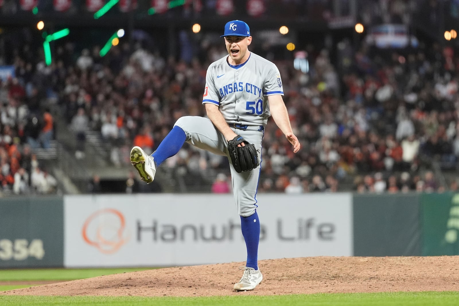 Kansas City Royals pitcher Kris Bubic (50) reacts after San Francisco Giants' Tyler Fitzgerald lined into a double play during the seventh inning of a baseball game in San Francisco, Monday, May 19, 2025. (AP Photo/Jeff Chiu)