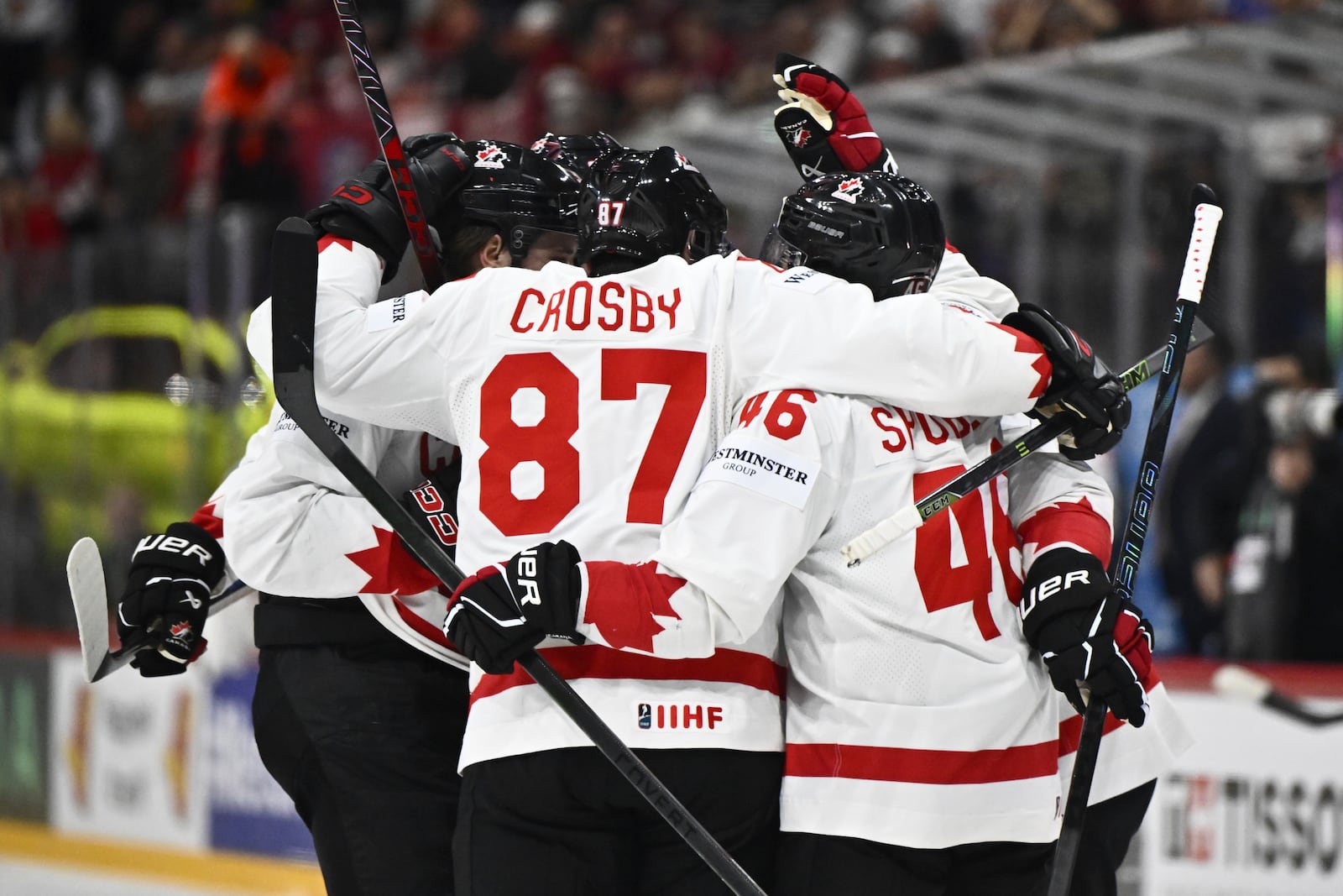 Canada celebrates the 1-1 goal by Travis Konecny, during the IIHF Ice Hockey World Championship group A match between Latvia and Canada at Avicii Arena in Stockholm, Sweden, Sunday May 11, 2025. (Christine Olsson/TT News Agency via AP)