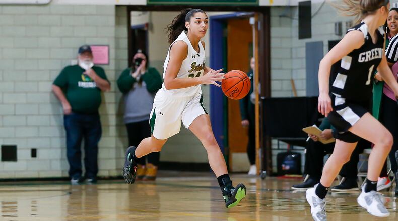 Catholic Central High School senior Mallory Mullen dribbles the ball up the floor during their game against Greenon on Saturday, Jan. 29, at Jason Collier Gymnasium. CONTRIBUTED PHOTO BY MICHAEL COOPER