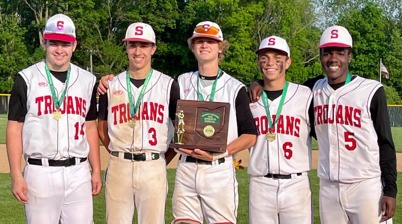 Cutline: The seniors on the Southeastern High School baseball team hoist the district championship trophy after beating Felicity-Franklin 16-0 on Wednesday evening at Versailles High School. MISSI SPEARS/CONTRIBUTED