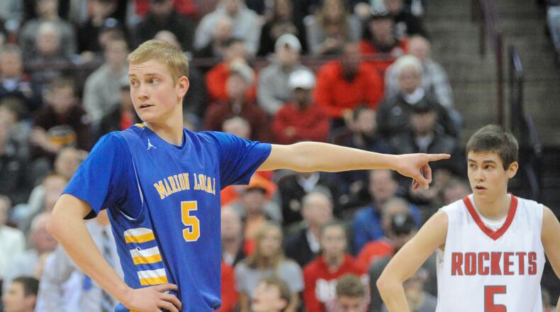 Marion Local senior Nathan Bruns helped the Flyers win a Division IV state championship last season and has signed to play basketball at the University of Findlay. MARC PENDLETON / STAFF