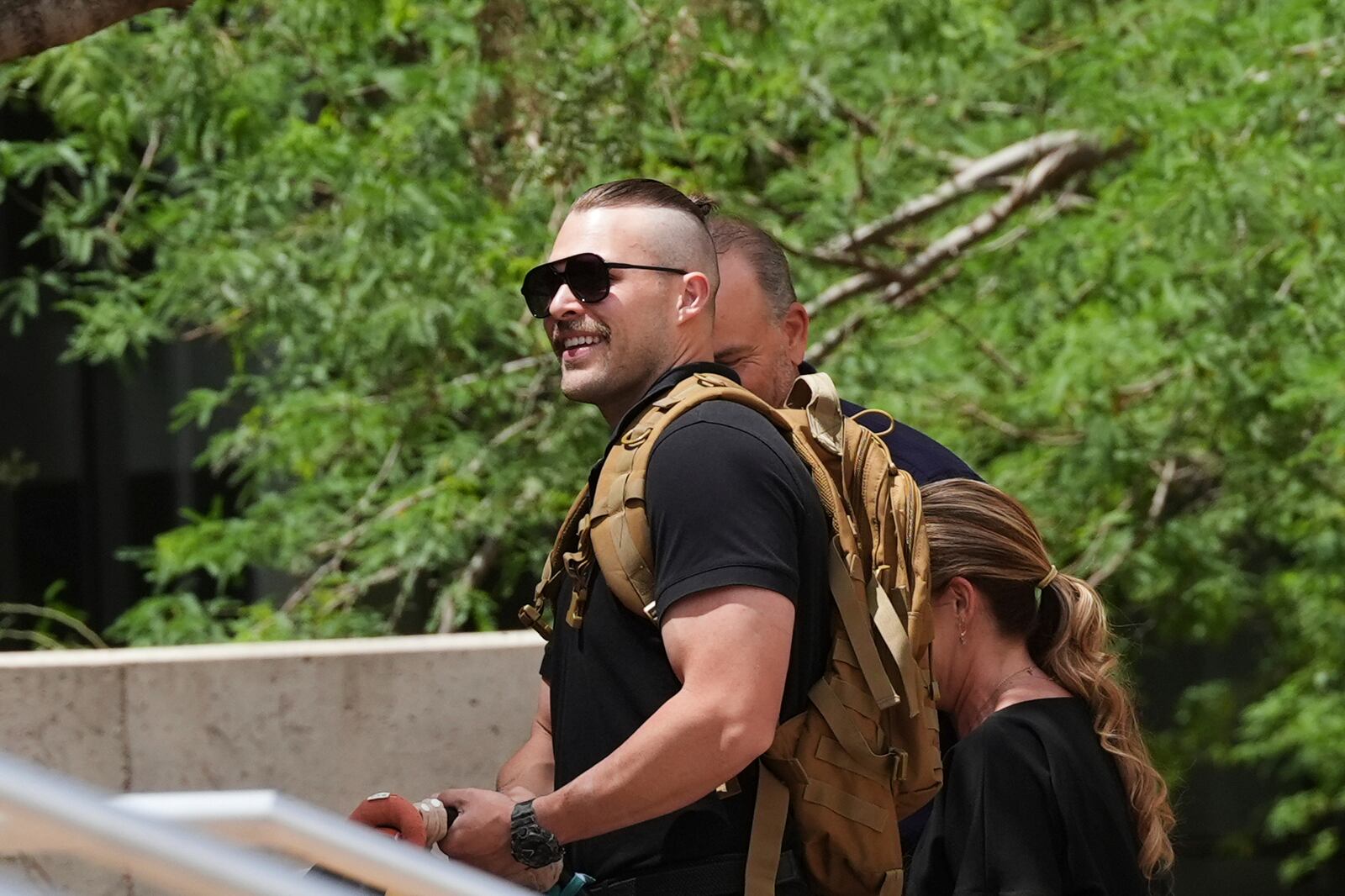 Colby Ryan arrives at Maricopa County Superior Court for the murder trial of Lori Vallow Daybell, his mother, who's charged with conspiring to murder her estranged husband, Monday, April 21, 2025, in Phoenix. (AP Photo/Ross D. Franklin)