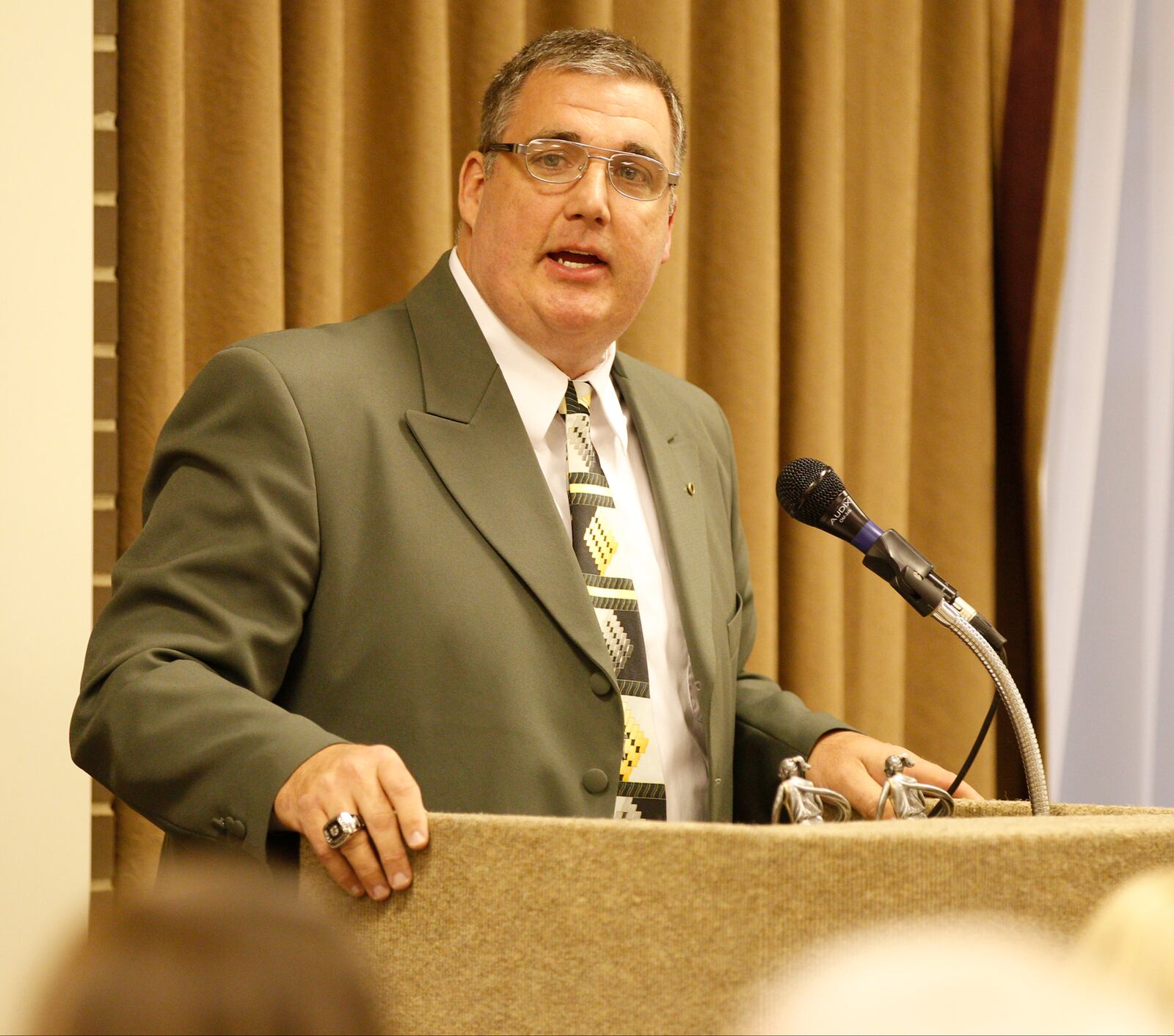 Greenon coach Gary Falkenbach speaks at the 25th Annual Coaches All-County Girls Basketball Team banquet on Wednesday, April 10, 2013. STAFF FILE PHOTO