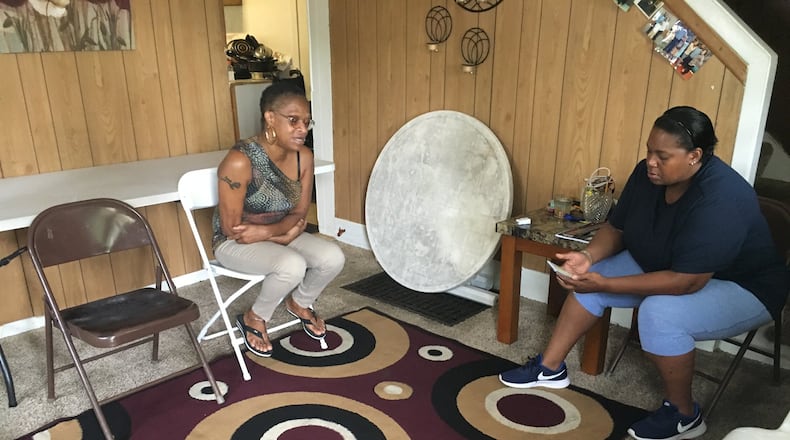 Susan Cameron-Johnson talks about her son, Gary Cameron, 22, who was shot to death Friday, July 20 in Springfield. Family friend Kuanice Locke is with her. STAFF