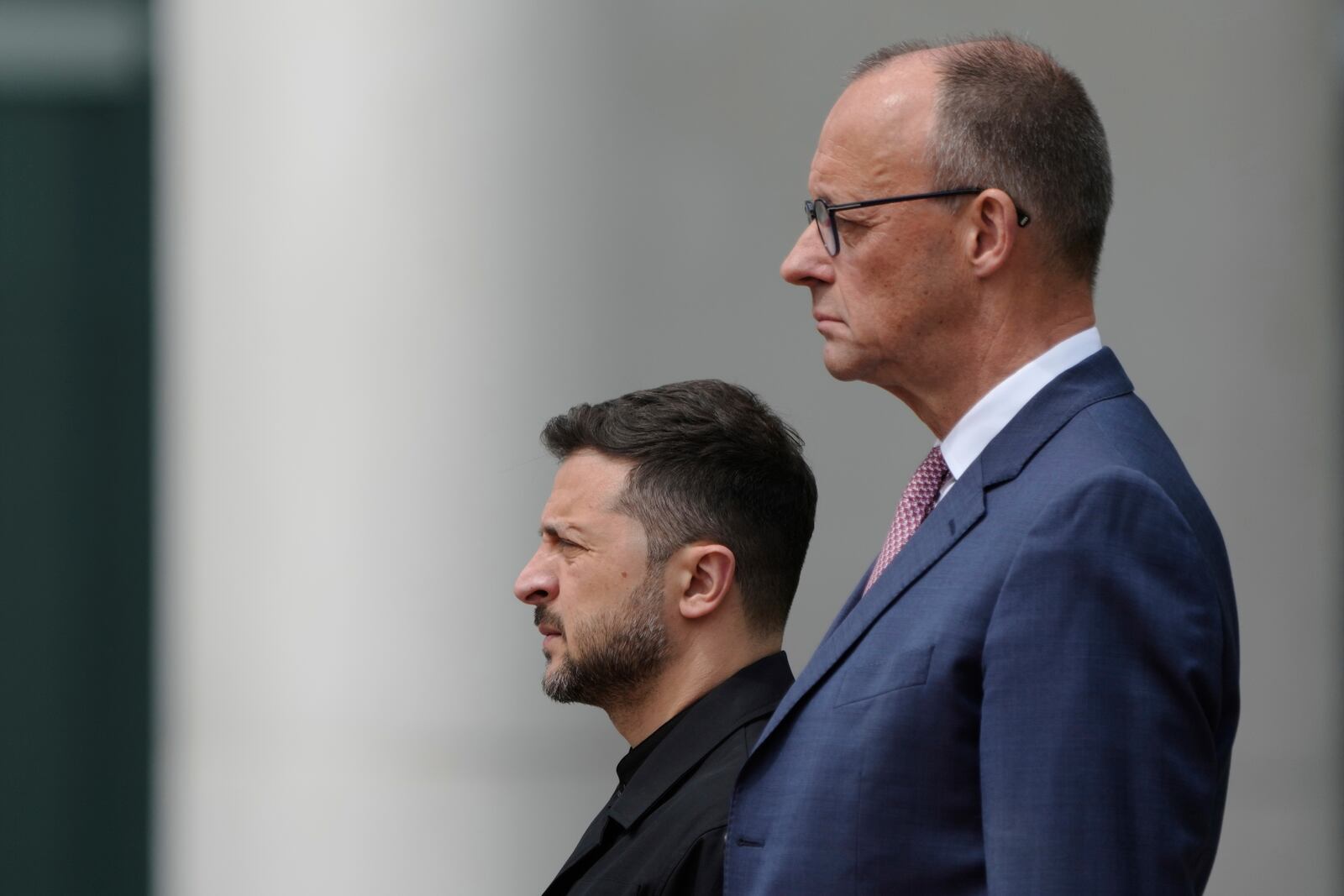 Germany's Chancellor Friedrich Merz, foreground, welcomes Ukraine's President Volodymyr Zelenskyy during an official military reception at the chancellery in Berlin, Germany, Wednesday, May 28, 2025.(AP Photo/Markus Schreiber)