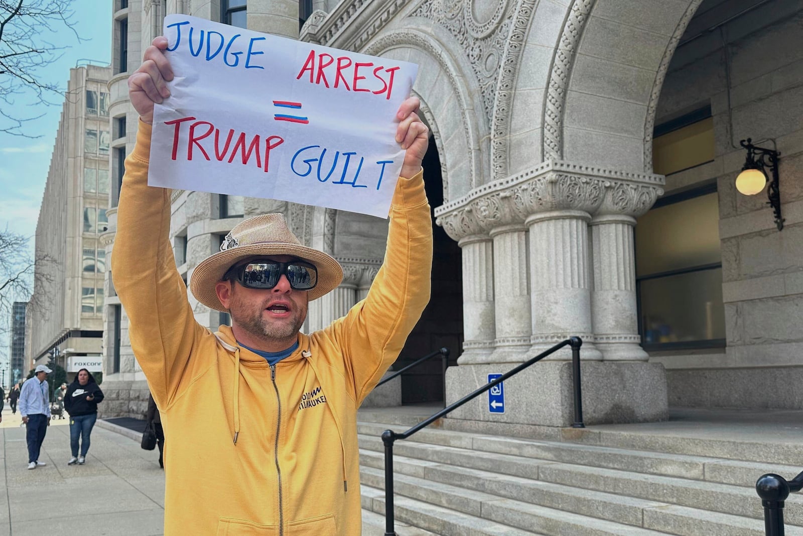 FILE - People gather to demonstrate the arrest of Judge Hannah Dugan, outside the Federal courthouse in Milwaukee, April 25, 2025. (AP Photo/Devi Shastri, File)