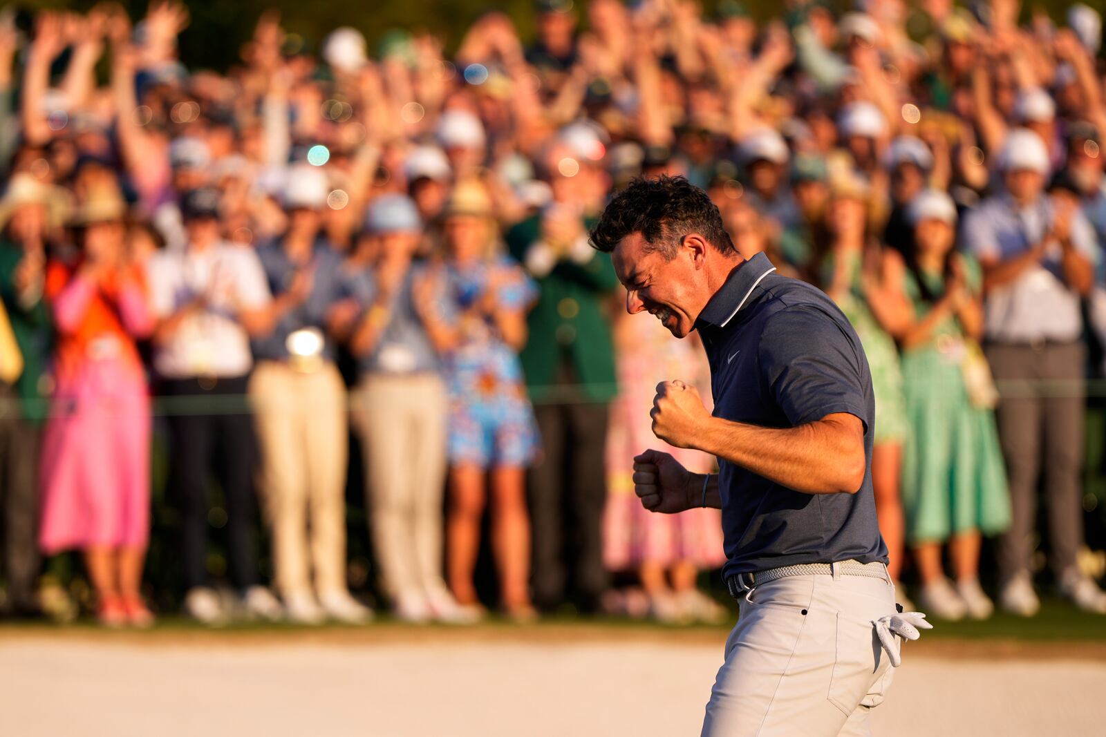 Rory McIlroy, of Northern Ireland, reacts after winning in a playoff against Justin Rose after the final round at the Masters golf tournament, Sunday, April 13, 2025, in Augusta, Ga. (AP Photo/Julia Demaree Nikhinson)