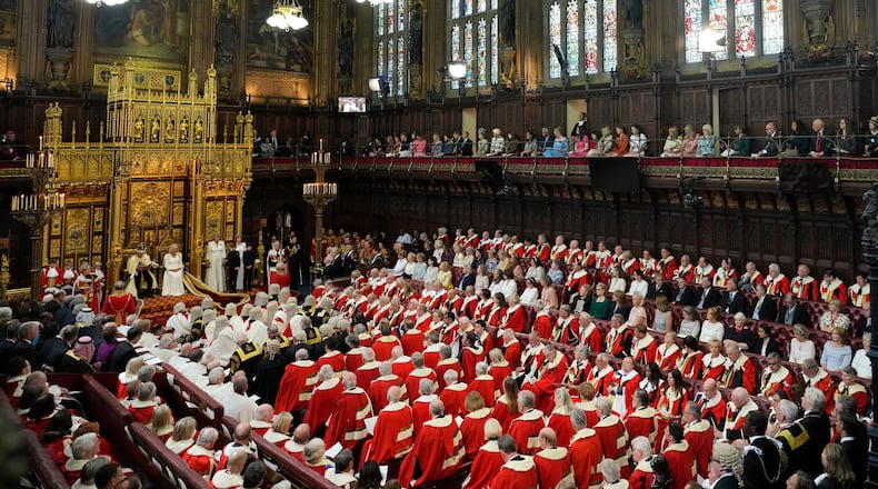 FILE-King Charles III reads the King's Speech, as Queen Camilla sits beside him during the State Opening of Parliament in the House of Lords, London, Wednesday, July 17, 2024. (AP Photo/Kirsty Wigglesworth, Pool)