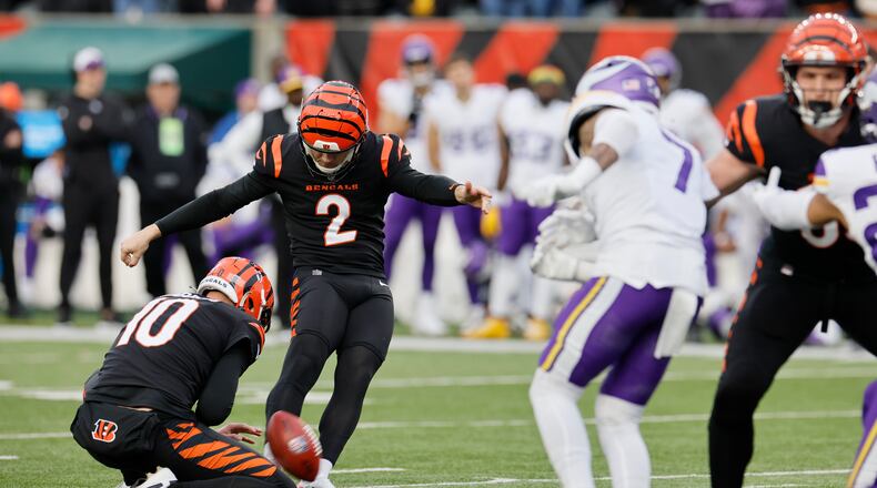 Cincinnati Bengals place kicker Evan McPherson (2) kicks the game-winning field goal in overtime of an NFL football game against the Minnesota Vikings Saturday, Dec. 16, 2023, in Cincinnati. (AP Photo/Jay LaPrete)