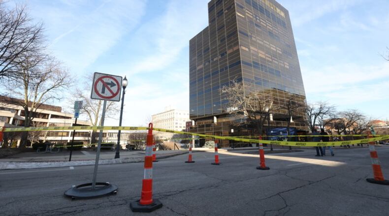 South Limestone Street is blocked between Main and High streets after a glass panel broke on the east side of the EF Hutton Tower on Sunday night./ Bill Lackey