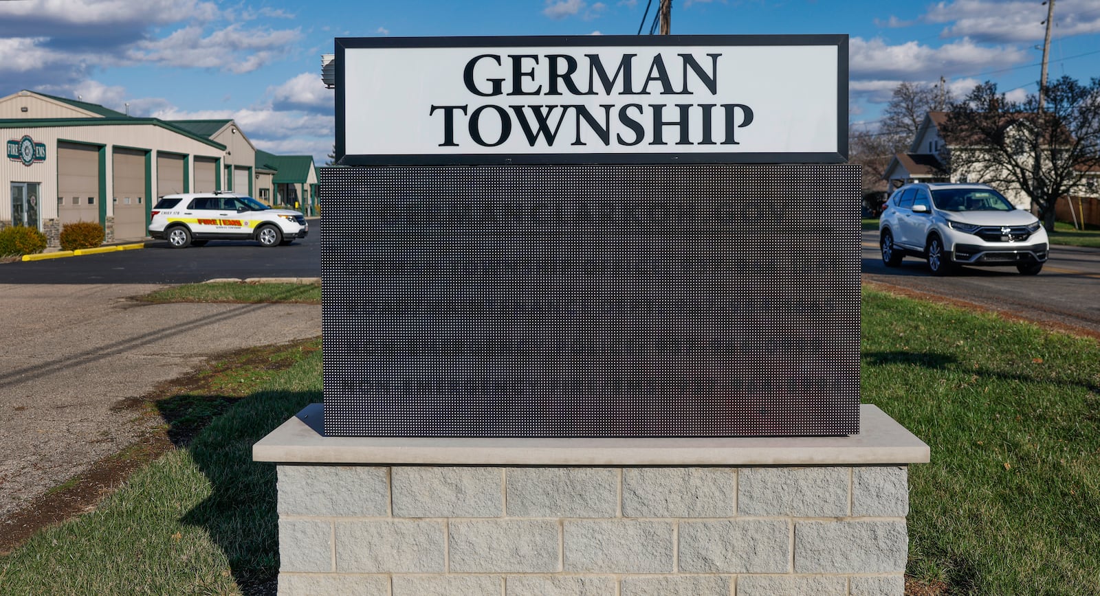 A vehicle drives past the German Township Fire Department  on Thursday, March 12, 2026, in Lawrenceville. JOSEPH COOKE/STAFF