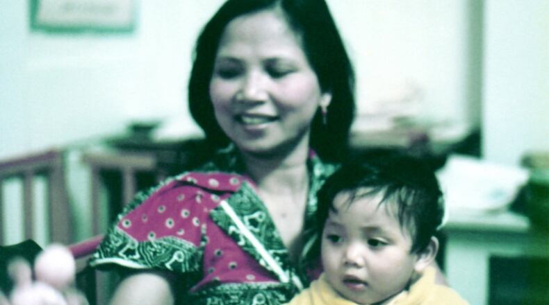 Voeung Keo holds her youngest child, Ravinn, who was born May 22, 1982, six weeks after their arrival in Springfield. CONTRIBUTED
