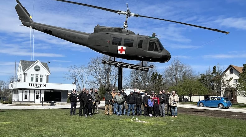 Huey’s Coffee opened at 504 N. Main St. in Urbana. This drive-through coffee shop displays a static model of a Huey helicopter in front of the shop. Contributed