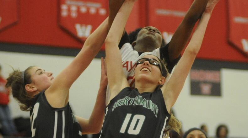 Shai McGruder (rear) transferred from Wayne to Trotwood-Madison for her senior season. MARC PENDLETON / STAFF