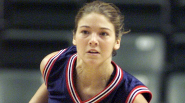 Christi Hester was a Dayton Flyers hoops star before marrying Xavier coach Chris Mack.