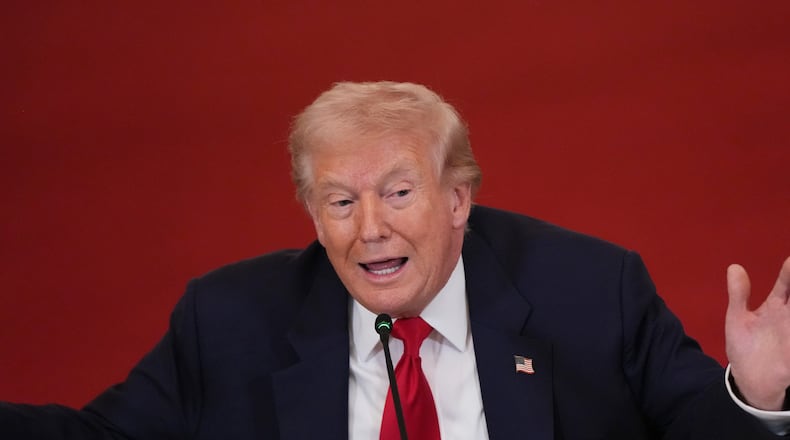 President Donald Trump speaks during a roundtable discussion on college sports in the East Room of the White House, Friday, March 6, 2026, in Washington. (AP Photo/Julia Demaree Nikhinson)