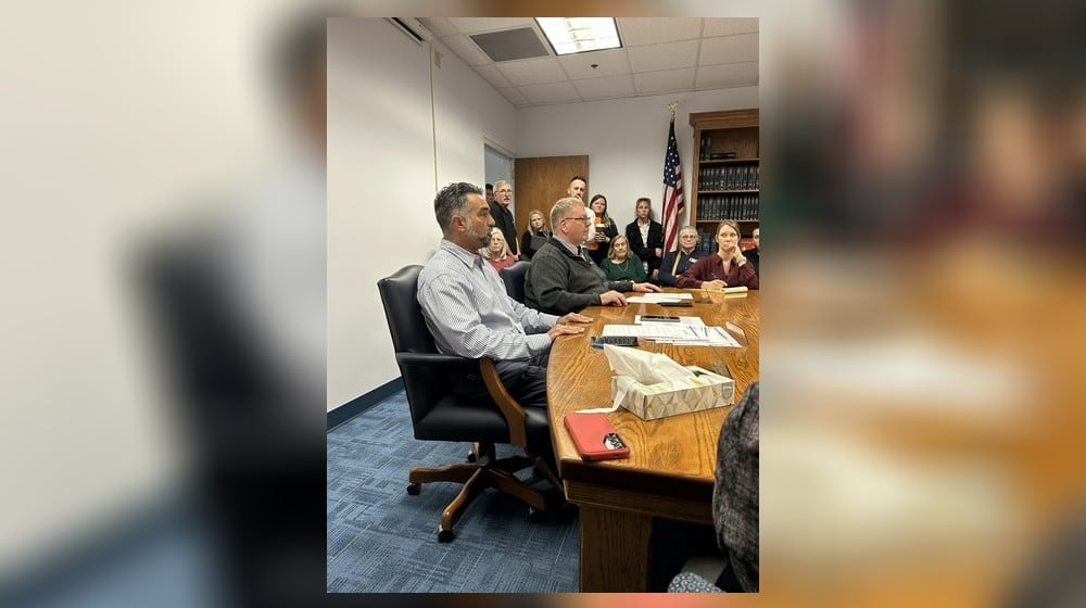 Champaign County Commissioners Nino Vitale (left) and Tim Cassady (right) during a Feb. 19 meeting. BROOKE SPURLOCK / STAFF