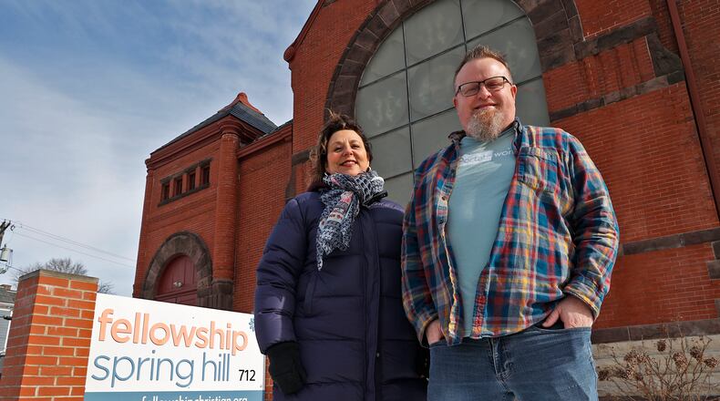 Tami Carter and Aaron Earlywine, with CarePortal, in front of Fellowship Spring Hill Church Friday, Jan. 27, 2023. CarePortal is a nonprofit online portal where churches and nonprofits help with emergency requests from local schools and agencies. BILL LACKEY/STAFF