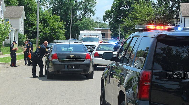 Springfield Police Division investigates a shooting on East Liberty Street. JEFF GUERINI/STAFF