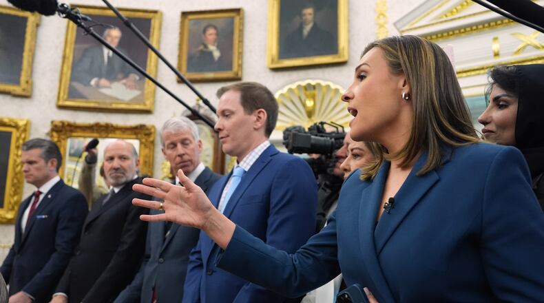 ABC News reporter Mary Bruce as a question as President Donald Trump meets Saudi Arabia's Crown Prince Mohammed bin Salman in the Oval Office of the White House, Tuesday, Nov. 18, 2025, in Washington. Listening from left are Defense Secretary Pete Hegseth, Commerce Secretary Howard Lutnick and Energy Secretary Chris Wright and David Broomell, Manufacturing Technology Manager at energy equipment manufacturer GE Vernova, listen. (AP Photo/Evan Vucci)