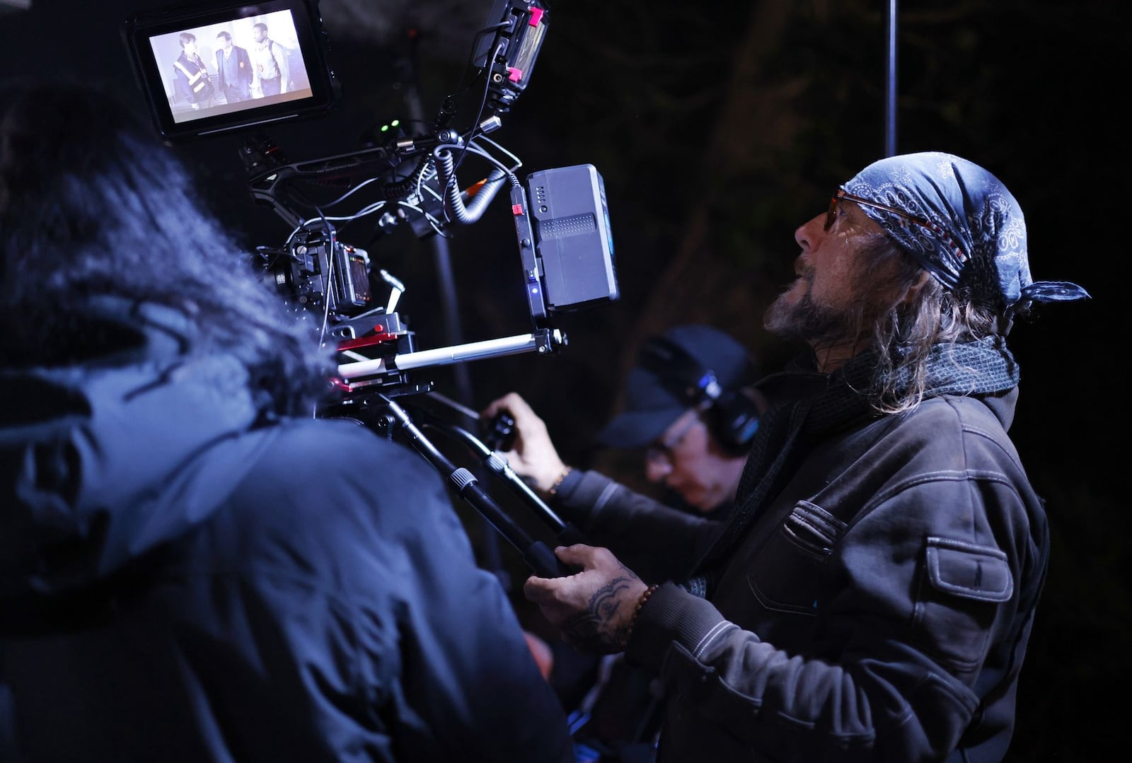Director of Photography Phillip Booth operates the camera on set of director Lana Read's new film, "Death for Dinner", at the historic home of Helen and Rick Stevens-Gleason in early morning hours Saturday, March 16, 2024 in Middletown. NICK GRAHAM/STAFF