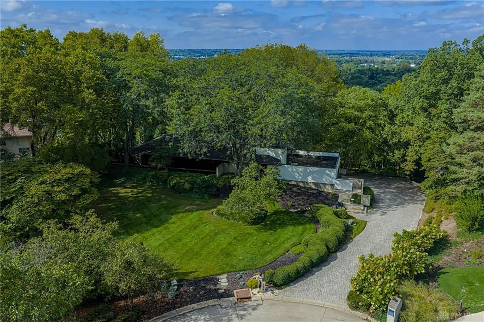 The one acre plus property is mostly wooded and is at the end of a cul-de-sac. CONTRIBUTED