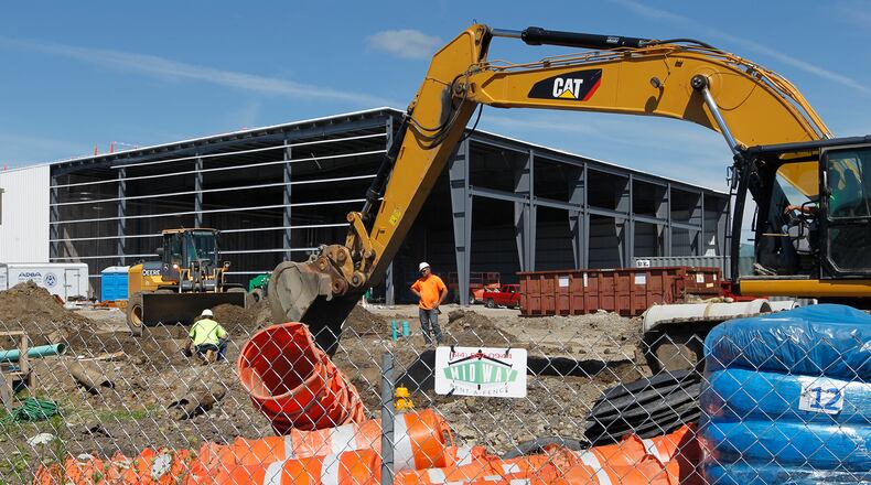 Construction continues on the Topre facility at the Champion City Business Park Tuesday. Bill Lackey/Staff