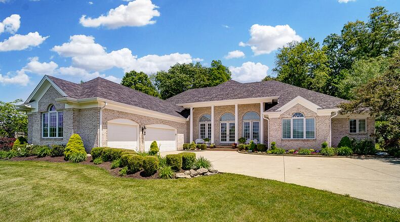 The all-brick, 3-bedroom ranch features about 4,200 sq. ft. of living space. The home is across from Locust Hills golf course on a cul-de-sac with a 3-car garage. CONTRIBUTED PHOTO