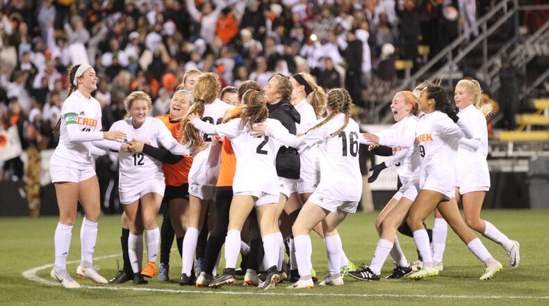 Beavercreek celebrates after a victory against Strongsville in the Division I state soccer championship on Friday, Nov. 9, 2018, at MAPFRE Stadium in Columbus. David Jablonski/Staff