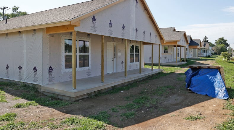 The three new houses that are being built by Neighborhood Housing Partnership of Greater Springfield on Clifton Avenue Tuesday, August 8, 2023. BILL LACKEY/STAFF