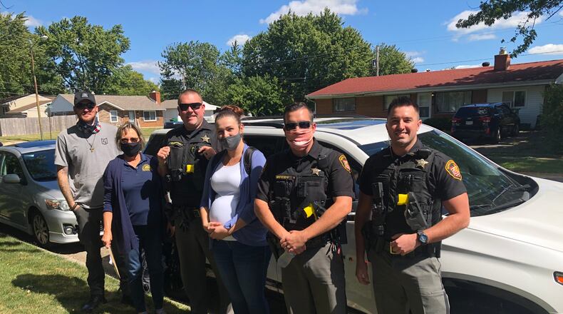 Members of the the Clark County Substance Abuse Coalition and Clark County Partners in Prevention teams work with local law enforcement to visit neighborhoods to hand out information on prevention and how to get help with substance abuse problems, even handing out free Narcan. Contributed photo