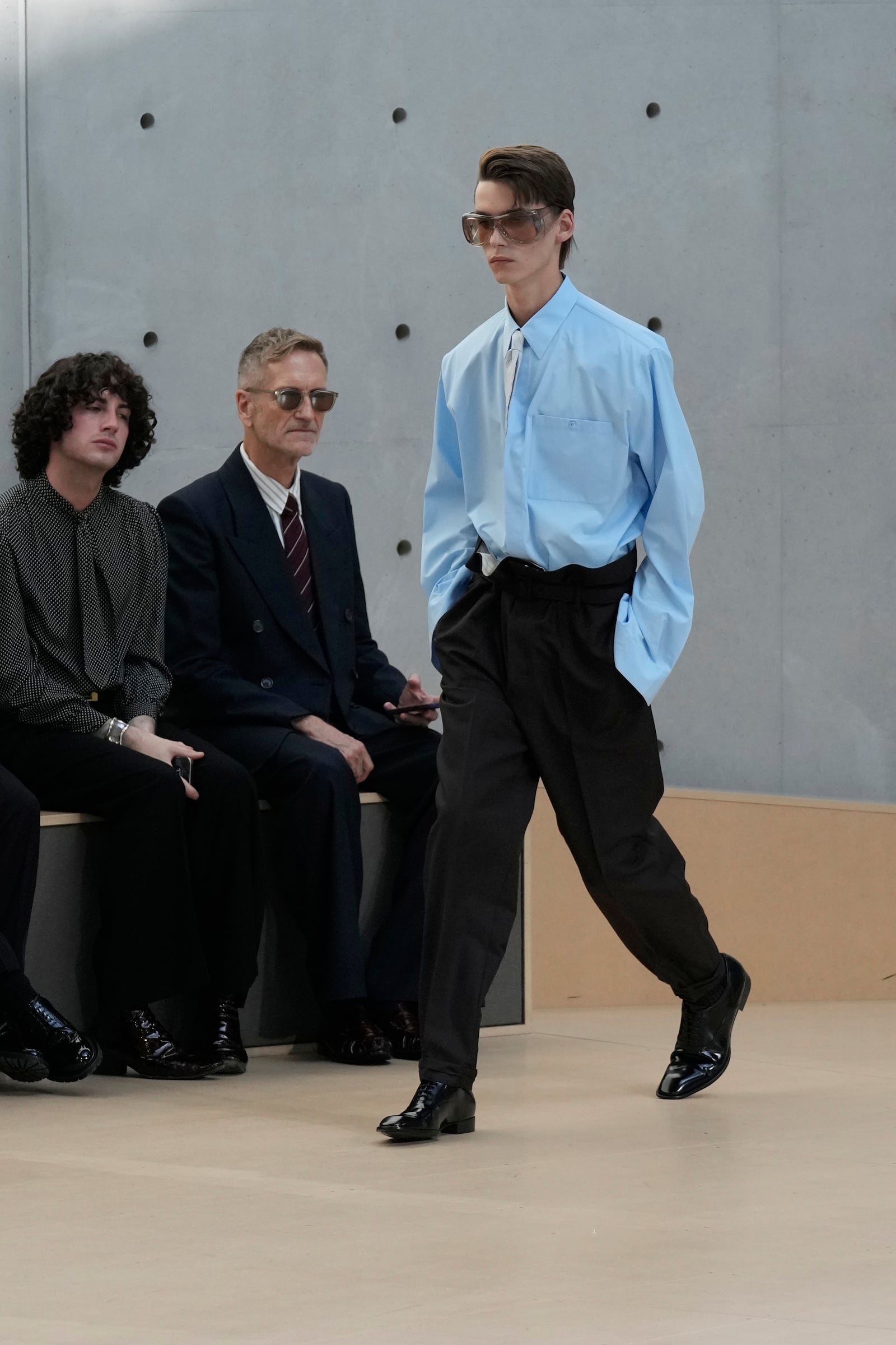 A model wears a creation as part of the men's Saint Laurent Spring-Summer 2026 collection, that was presented in Paris, Tuesday, June 24, 2025. (AP Photo/Michel Euler)