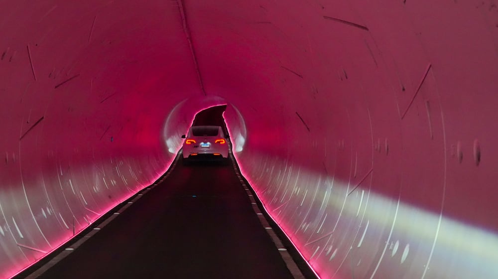 A Tesla is driven through the Vegas Loop under the city on Wednesday, Feb. 4, 2026, in Las Vegas. (AP Photo/Ty ONeil)