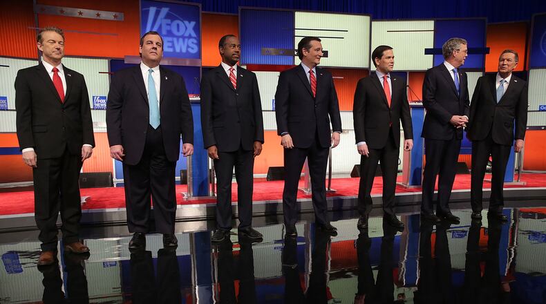 GOP DEBATE--DES MOINES, IA - JANUARY 28: Republican presidential candidates (R-L) Ohio Governor John Kasich, Jeb Bush, Sen. Marco Rubio (R-FL), Sen. Ted Cruz (R-TX), Ben Carson, New Jersey Governor Chris Christie and Sen. Rand Paul (R-KY) pose for photographers prior to the Fox News - Google GOP Debate January 28, 2016 at the Iowa Events Center in Des Moines, Iowa. Residents of Iowa will vote for the Republican nominee at the caucuses on February 1. Donald Trump, who is leading most polls in the state, decided not to participate in the debate. (Photo by Alex Wong/Getty Images) *** BESTPIX ***
