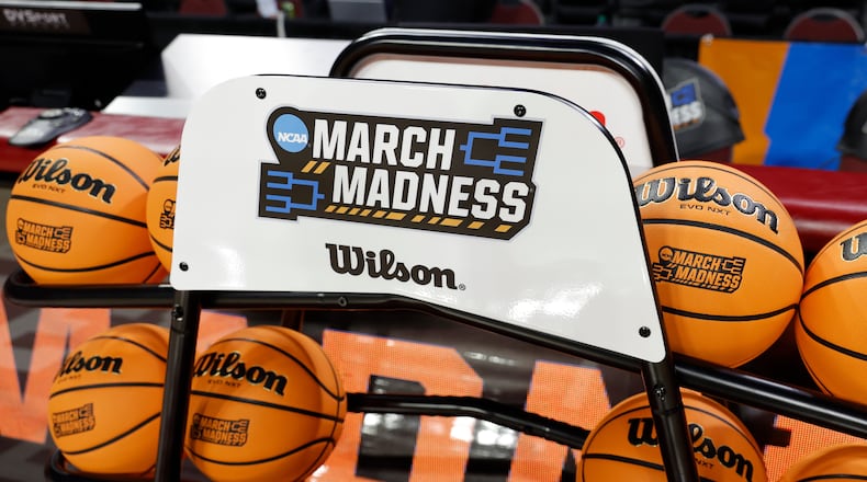 March Madness signage is displayed before a game between Colorado State and Michigan State in the first round of the NCAA college basketball tournament, Friday, March 20, 2026, Norman, Okla. (AP Photo/Alonzo Adams)