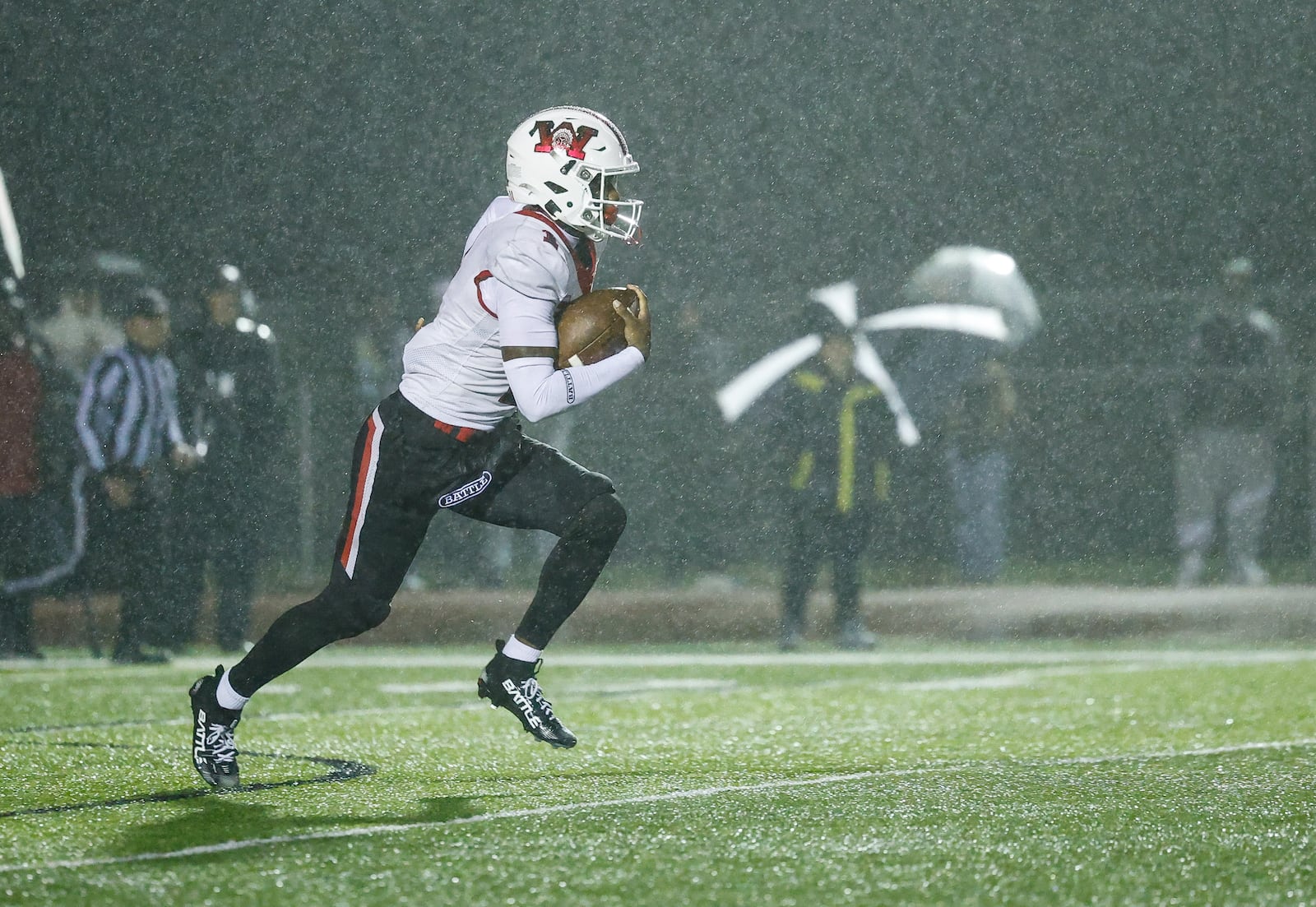 Wayne's Jamier Averett-Brown returns a kickoff for a touchdown during their Division I Regional football final against Middletown Friday, Nov. 21, 2025 at Trotwood Madison High School. Middletown won 21-14 to advance. NICK GRAHAM/STAFF